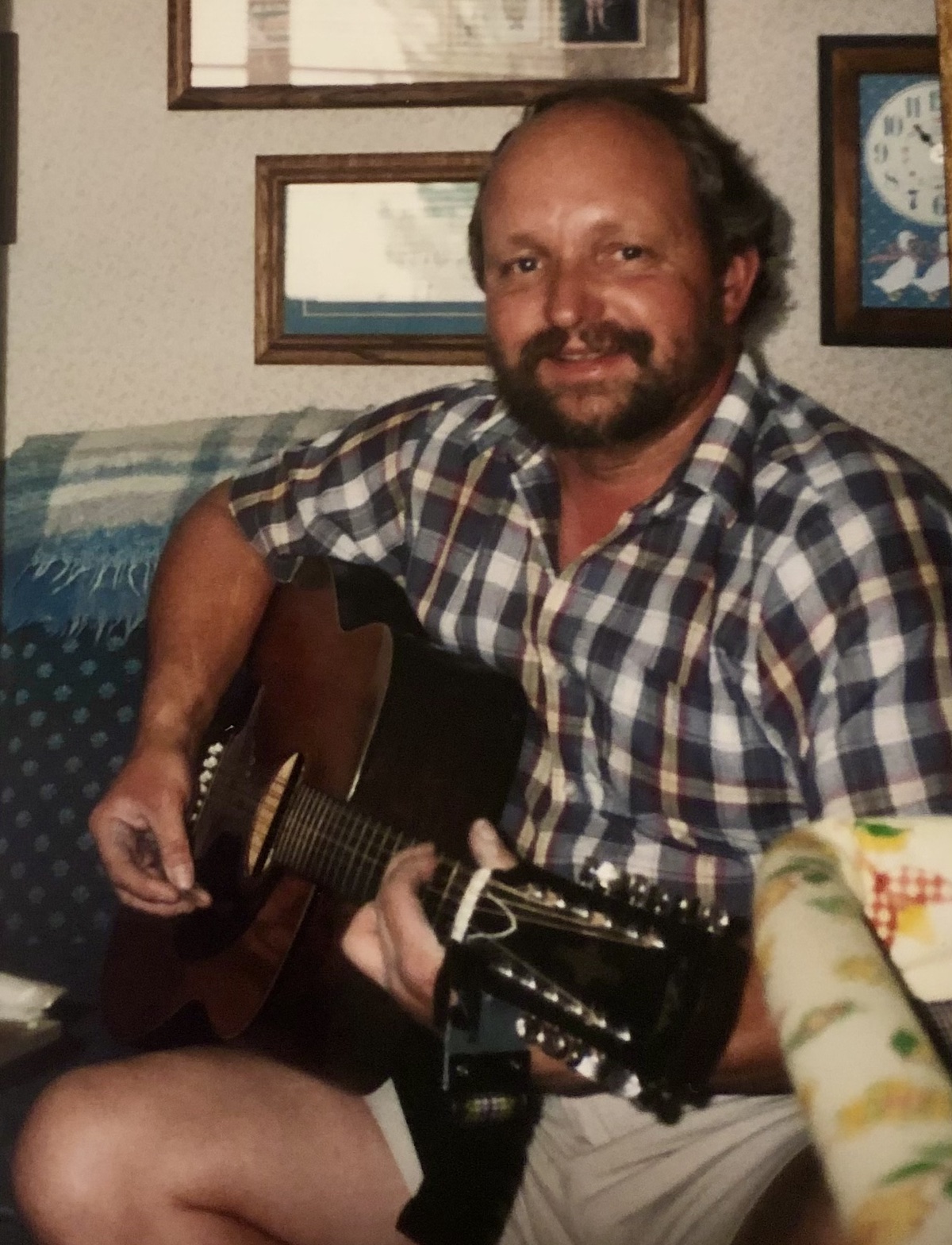 Dennis Mathson with his 12-string acoustic guitar