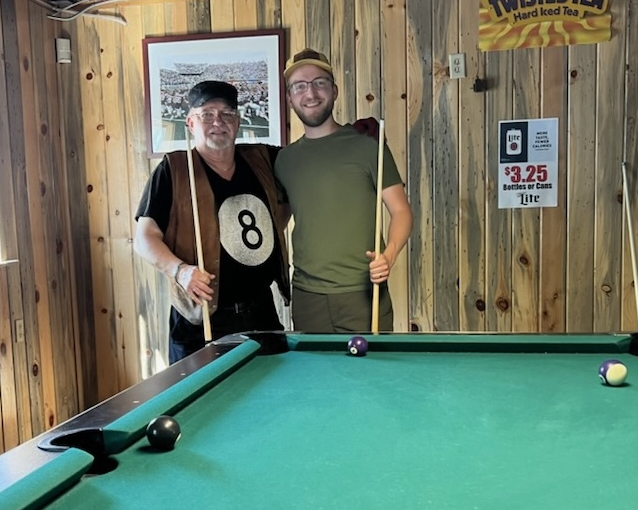 Scott and Dennis playing pool photo